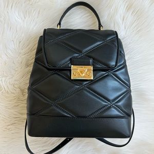 $628 Retail New! Black quilted genuine leather backpack purse